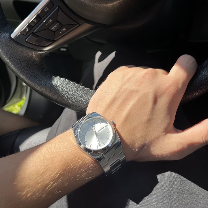 Relógio Nibosi Masculino Minimalista 2658 Com Pulseira de Aço Inoxidável Prata e Visor Branco