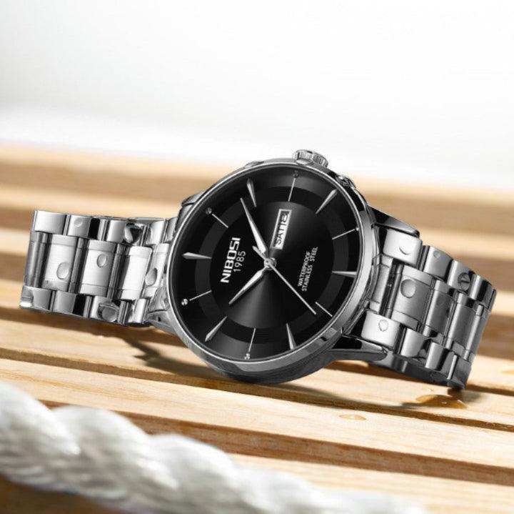 Relógio Nibosi Minimalista Masculino Signature Pulseira de Aço Inoxidável Prata Com Visor Preto