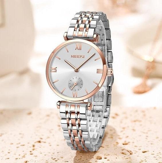 Relógio minimalista feminino Nibosi pequeno 32mm com pulseira em aço inoxidável prata e rosé com visor branco