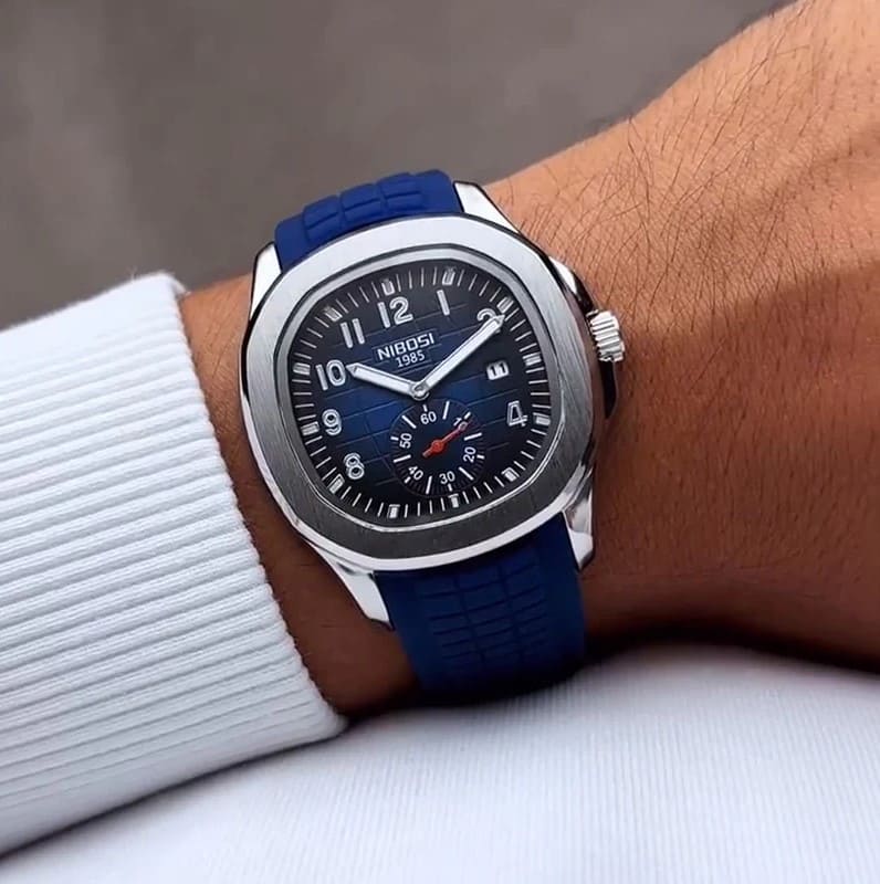 Relógio Nibosi Masculino com pulseira de borracha azul e visor azul