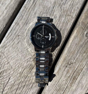 Relógio Nibosi Masculino 2309 Com Pulseira de Aço Inoxidável Prata e Visor Preto