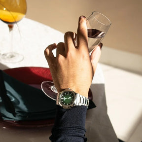 RelÃ³gio Nibosi Masculino prata com visor verde 
