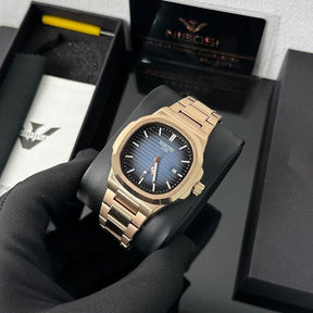 Relógio Nibosi masculino Astronaut com pulseira e caixa em aço inoxidável e visor azul numa caixa
